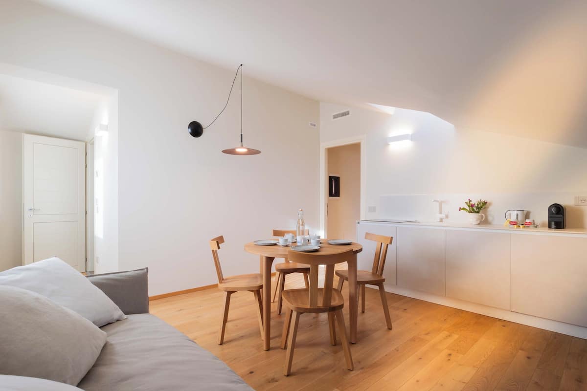 Family Apartment | Living area | 40-inch flat-screen TV with satellite channels
