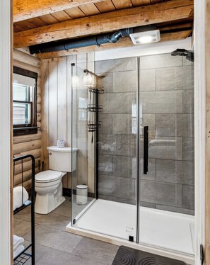 Shower, hair dryer, towels, shampoo