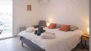 2 slaapkamers, een strijkplank/strijkijzer, reisbedje, wifi