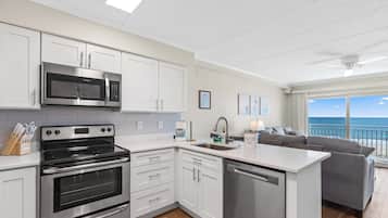 Coffee/tea maker, fridge, microwave, oven