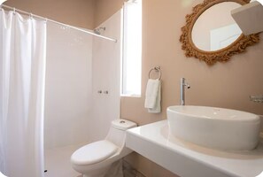 Shower, hair dryer, towels, soap