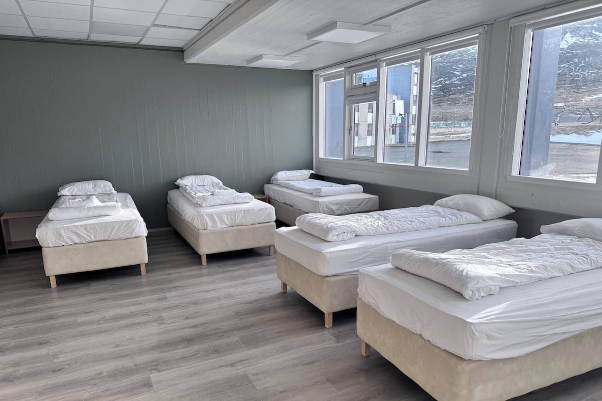 Family Room, Shared Bathroom, Lake View | Iron/ironing board, free WiFi, bed sheets