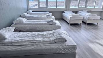 Family Room, Shared Bathroom | Iron/ironing board, free WiFi, bed sheets
