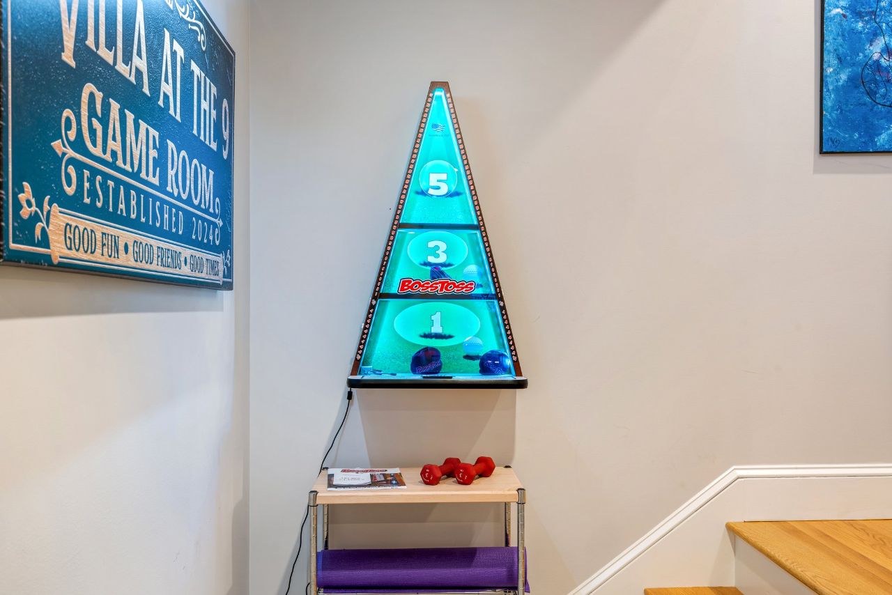 Game room with bunk bed, 6 commercial-grade arcade games, wet bar, and Xbox
