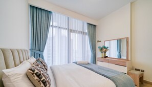 Comfort Apartment, City View | 1 bedroom, in-room safe, blackout curtains, iron/ironing board - Exquisite Living in Riviera One Bedroom (Dubai)