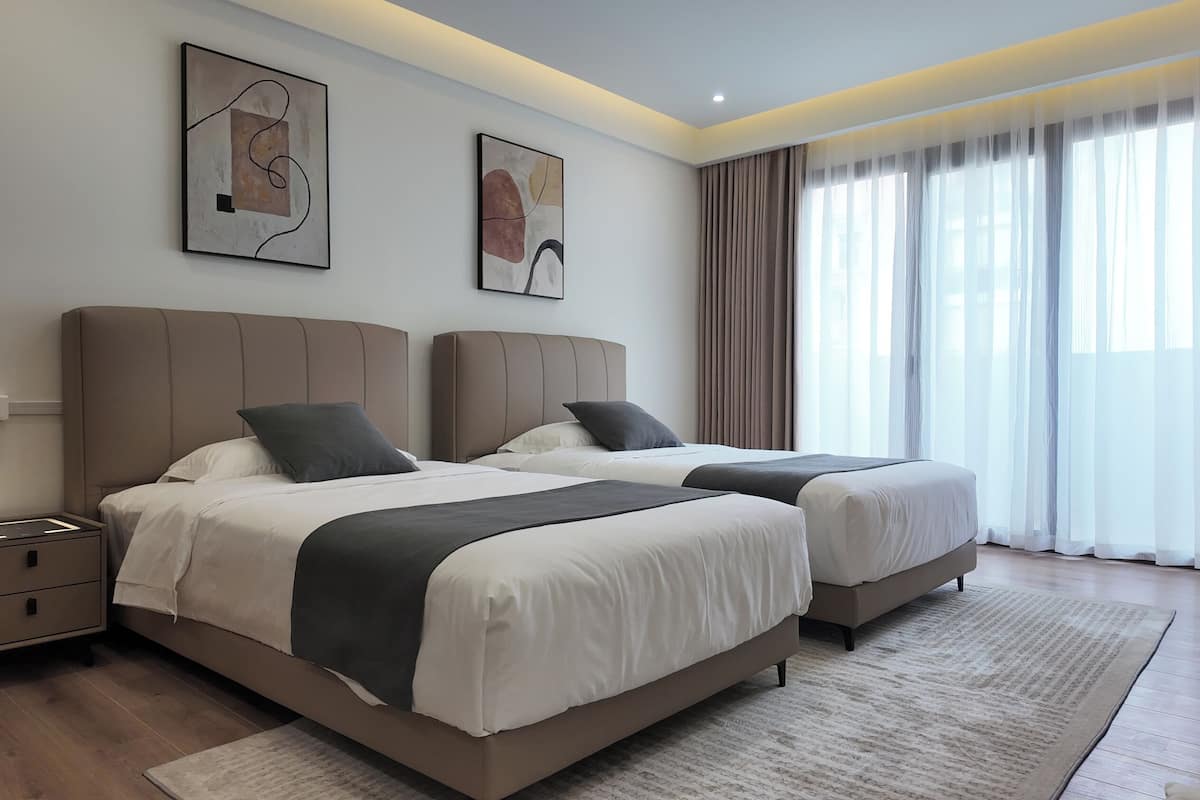 Pillow-top beds, free minibar, laptop workspace, blackout curtains