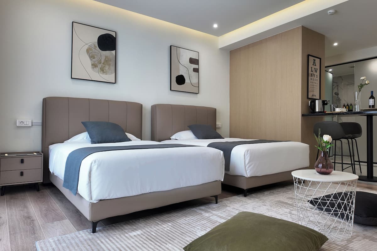 Pillow-top beds, free minibar, laptop workspace, blackout curtains