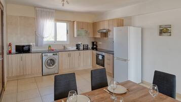 Superior Apartment, Balcony, Pool View | Private kitchen | High chair