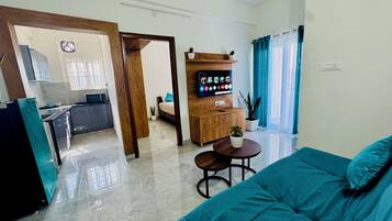 Superior Apartment, 1 Queen Bed with Sofa bed, Kitchenette, Garden View | Living area | TV