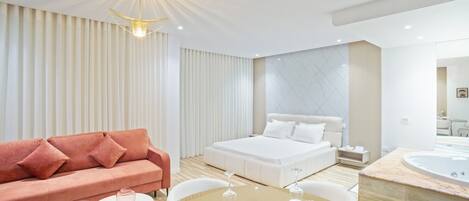 Suite Deluxe | 1 chambre, minibar, coffres-forts dans les chambres, rideaux occultants