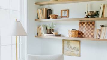 Smart TV, fireplace, books