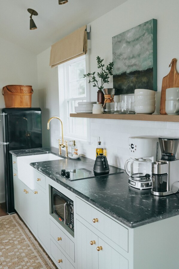 Fridge, microwave, coffee/tea maker, toaster