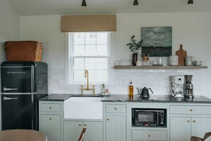 Fridge, microwave, coffee/tea maker, toaster