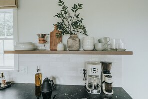 Fridge, microwave, stovetop, coffee/tea maker