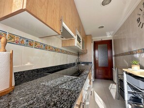 Fridge, microwave, oven, coffee/tea maker