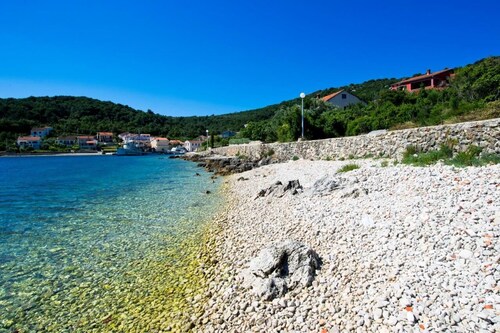 A relaxing beachside house with a hot tub overlooking the sea in Zadar County.