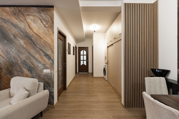 Apartamento conforto | Área de estar | TV de tela plana