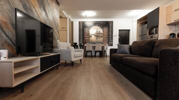 Comfort Apartment | Living area | Flat-screen TV