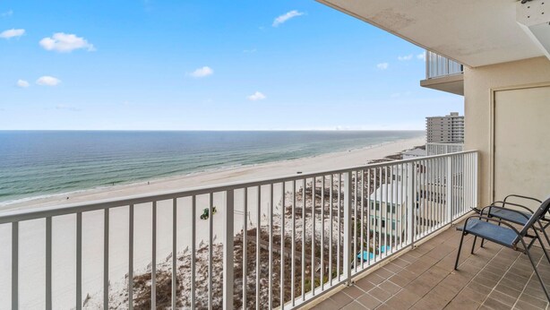 A balcony with a view of the beach and ocean. - Shoalwater 1005 (Orange Beach)