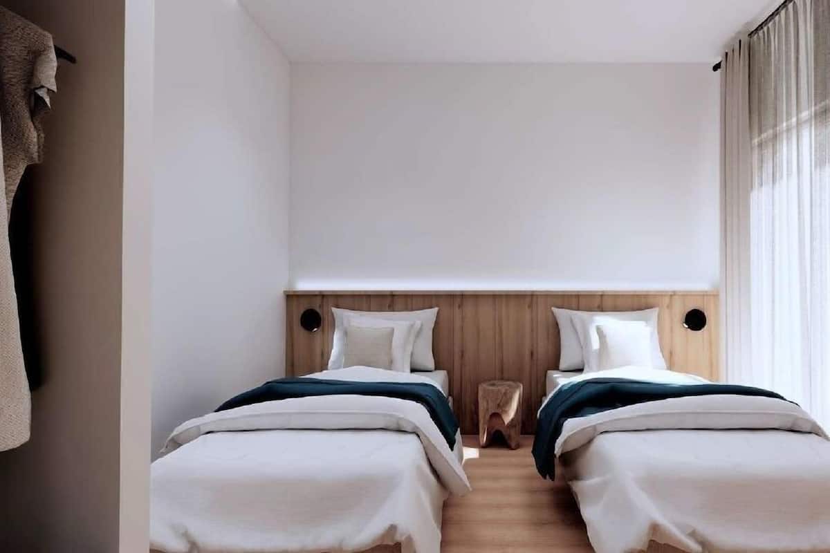 Een strijkplank/strijkijzer, gratis wifi, beddengoed