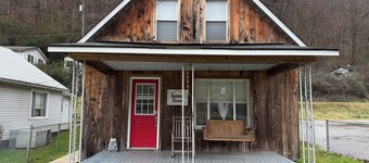 Cozy 2-bedroom cabin in Gilbert. Located close to RockHouse and Devil Anse Trail