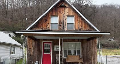 Cozy 2-bedroom cabin in Gilbert. Located close to RockHouse and Devil Anse Trail