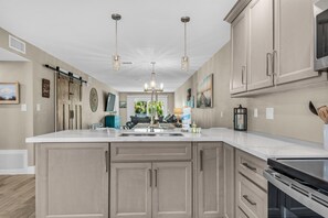 Condo, Multiple Beds (Deep Water Cove 103) | Private kitchen | Oven, toaster - Deep Water Cove 103 (Pensacola Beach)