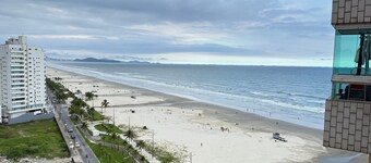 Foot in the sand at Caiçara beach IV