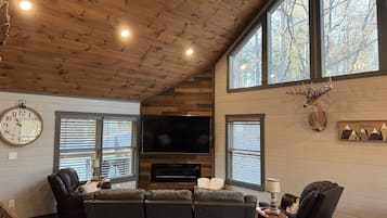 Smart TV, fireplace, foosball, books