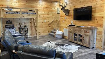 Smart TV, fireplace, foosball, books