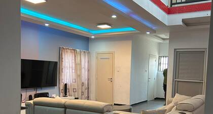 Spacious 4-bedroom house with AC and WiFi in charming Adenta Municipality