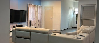 Spacious 4-bedroom house with AC and WiFi in charming Adenta Municipality