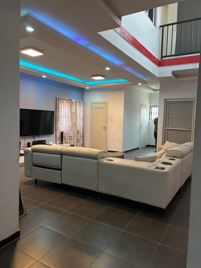 Spacious 4-bedroom house with AC and WiFi in charming Adenta Municipality