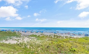 On the beach, sun loungers - Oceanfront Condo in Ocean Isle Beach That Sleeps 6 (Ocean Isle Beach)