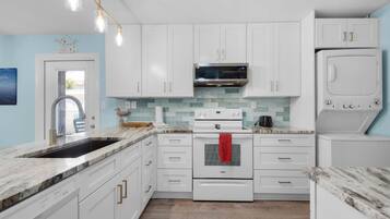 Condo, Multiple Beds (Beachview 102 - Flaming Sunrise) | Private kitchen | Oven, toaster