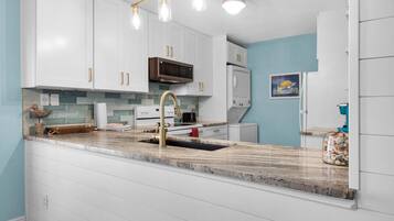 Condo, Multiple Beds (Beachview 102 - Flaming Sunrise) | Private kitchen | Oven, toaster