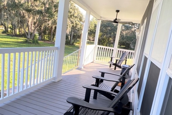 Large front with 4 chairs perfect for a morning cup of joe