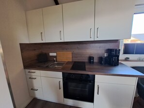 Geladeira, fogão, cooktop, cafeteira/chaleira