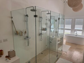 Shower, jetted bath, towels, soap