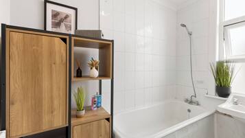 Hair dryer, towels, soap, toilet paper