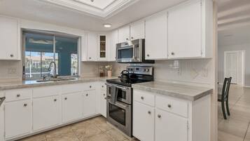 House, Multiple Beds, Pool Access, Pool View (SUR1406) | Private kitchen | Coffee/tea maker, electric kettle