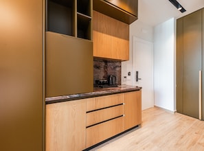 Enjoy cooking in this well-equipped kitchen with a stove and coffee maker.