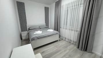 2 dormitorios, tabla de planchar con plancha, wifi y ropa de cama
