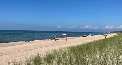 Walk to the beach from this charming 2 bed/1 bath home in historic Michigan City