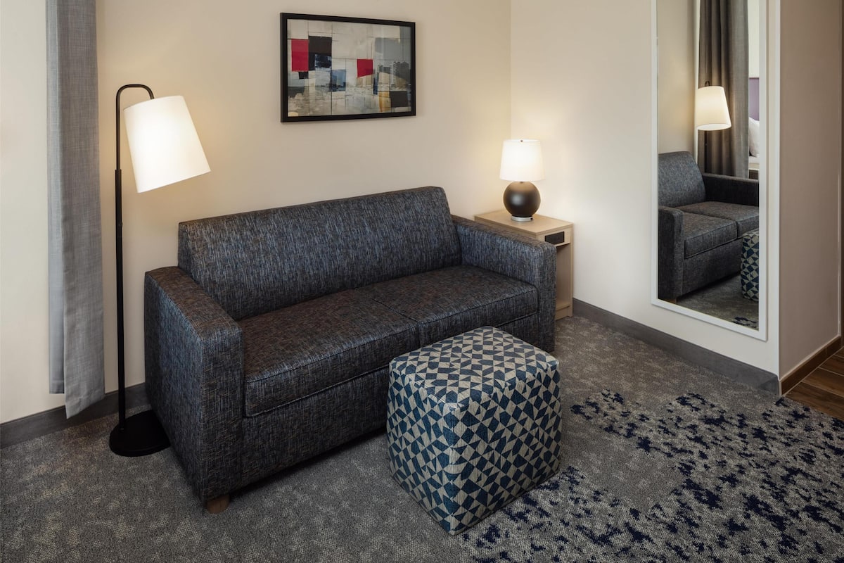 55-inch flat-screen TV with cable channels, pay films