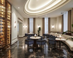 A luxurious hotel lobby with marble flooring, elegant seating, and a wine cellar. - Les Temps Istanbul Karakoy, Curio Collection By Hilton (Istanbul)