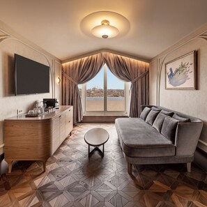 Signature Suite, 1 King Bed, Balcony | Living area | 55-inch TV with cable channels - Les Temps Istanbul Karakoy, Curio Collection By Hilton (Istanbul)