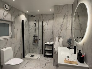 Shower, hair dryer, towels, soap