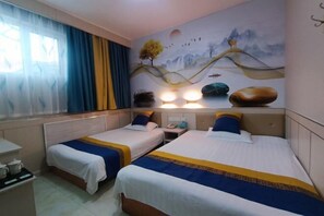 A hotel room with two beds, a mural on the wall, and a window with curtains. - Garden Hotel (Sankong Scenic Spot) (Qufu)