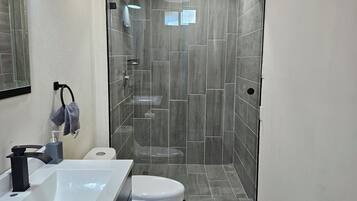 Hair dryer, towels, soap, toilet paper